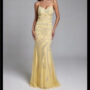 Yellow beaded mermaid gown. silver and yellow jewels. Sean Collection Formal 2